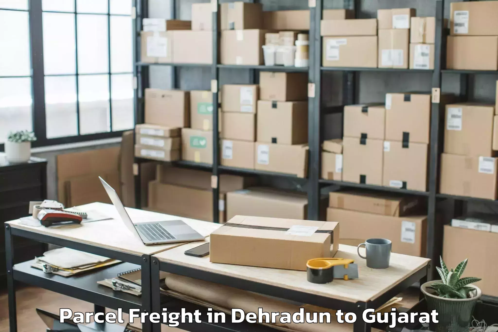 Leading Dehradun to Bavla Parcel Freight Provider